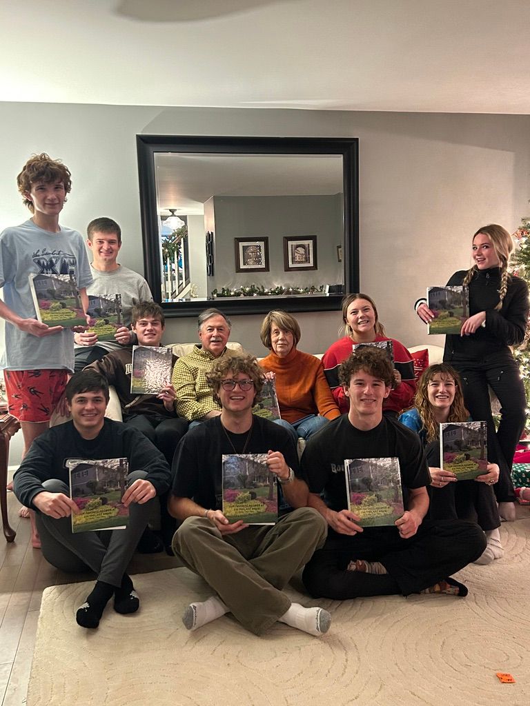 Family with their cookbook